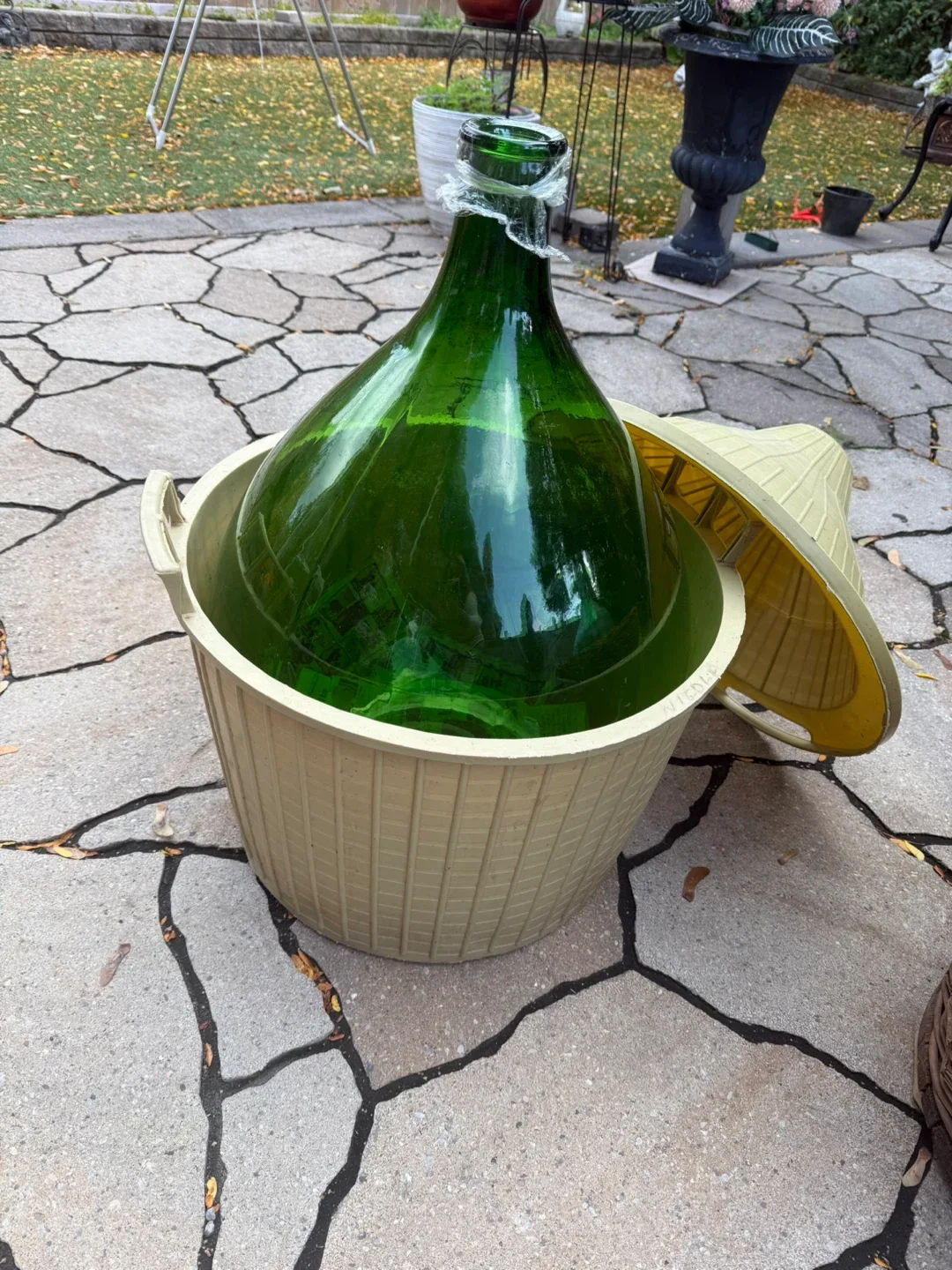 Large Green Glass Demijohn in Plastic Basket