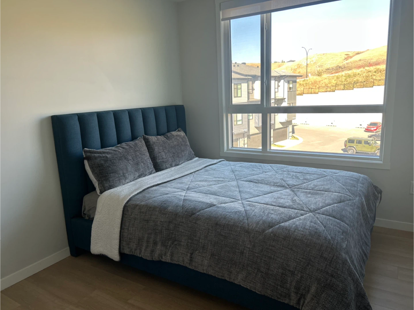 MOVE OUT SALE - BED AND MATTRESS - Blue Upholsted - Queen Size