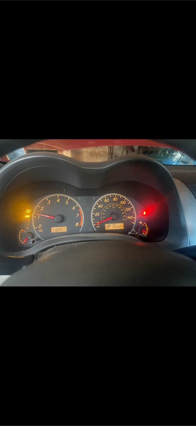 Red Toyota Corolla - 129k miles image indicator(2)