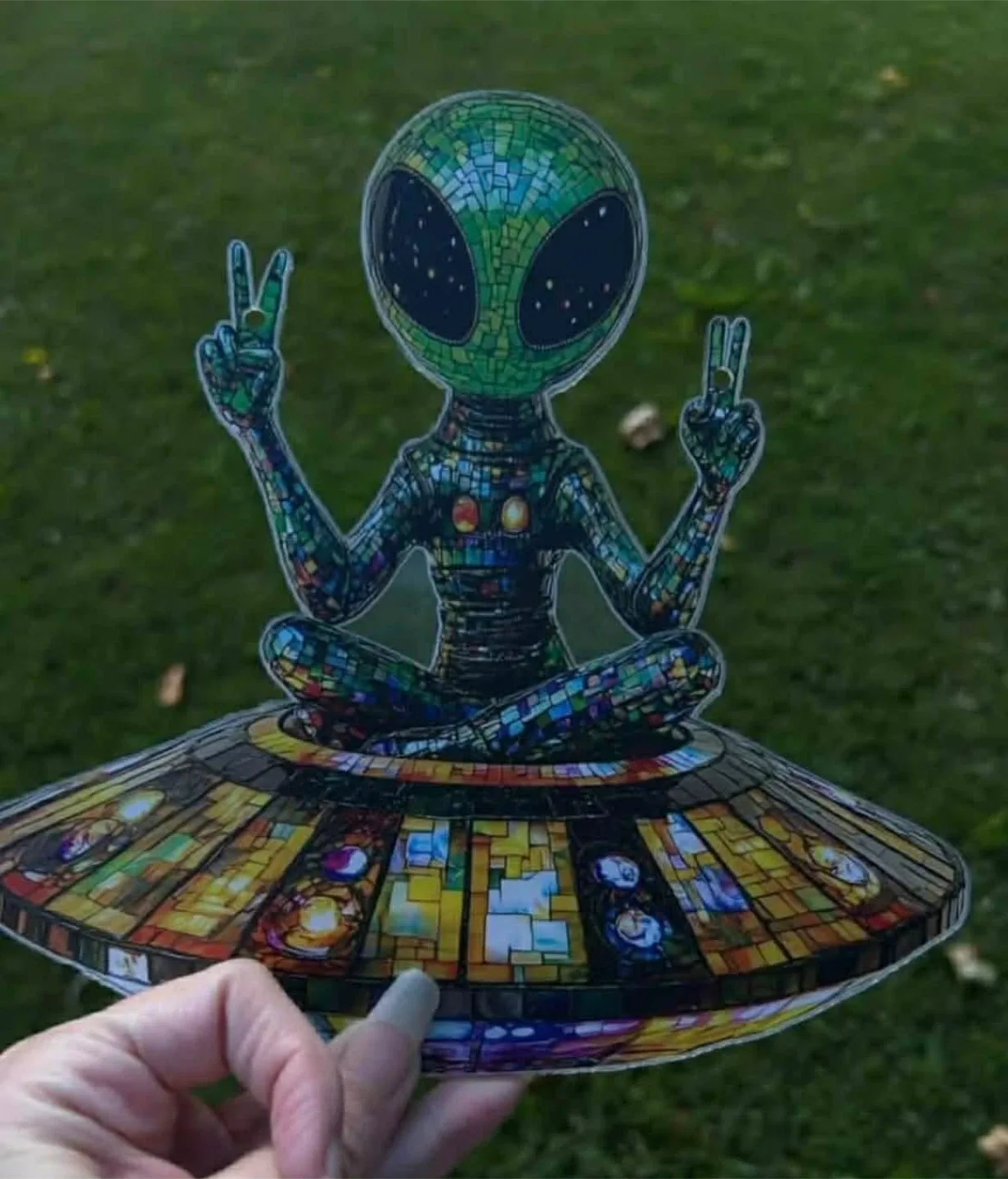 2D acrylic sun catcher, alien sitting on a space ship, new