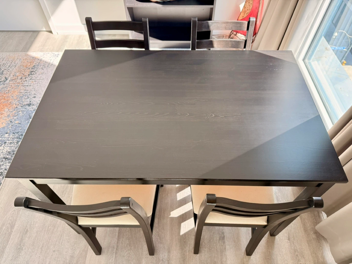IKEA Black Dining Table with White Cushioned Chairs(4) - photo 2