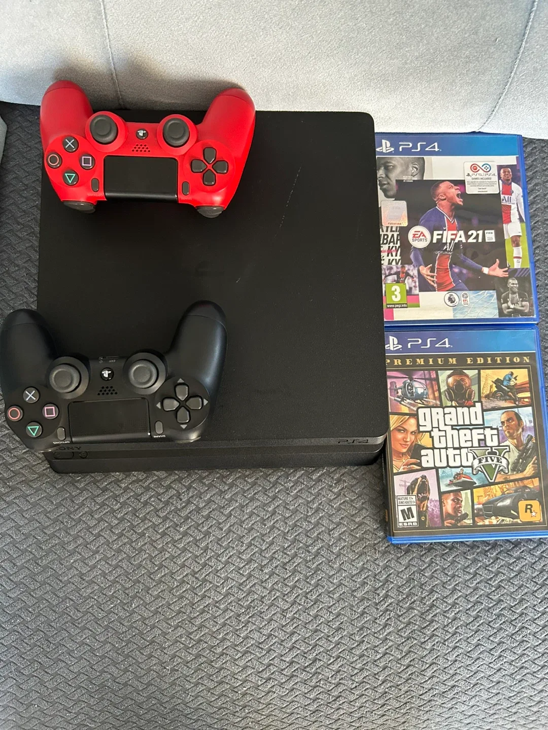 PlayStation 4 1 TB with Games and Controllers image indicator(2)