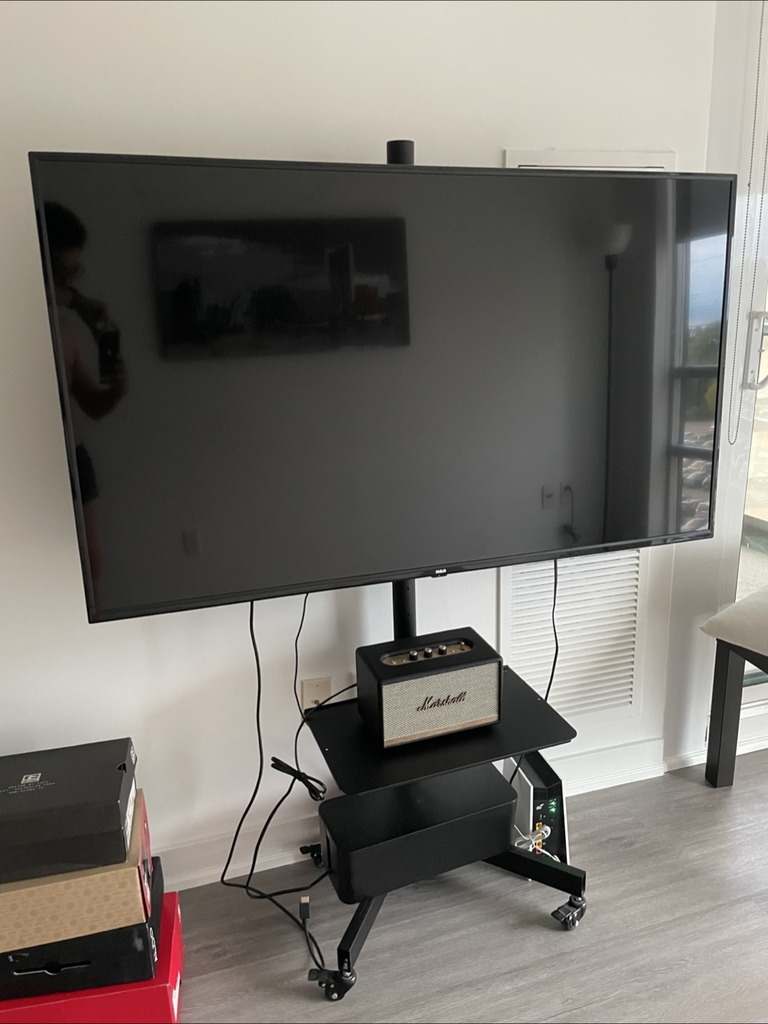 RCA 55" 4K Ultra HD Smart TV with moving stand