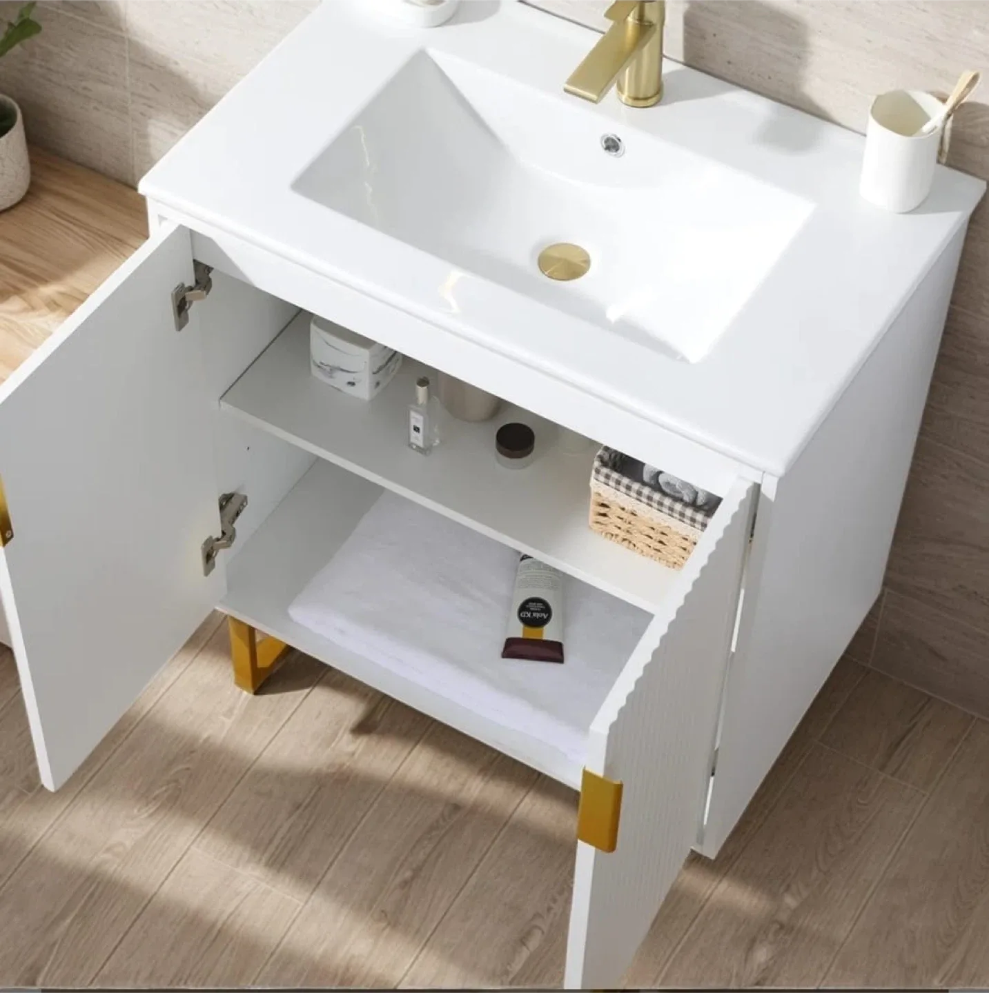White Bathroom Vanity with Gold Accents image indicator(4)