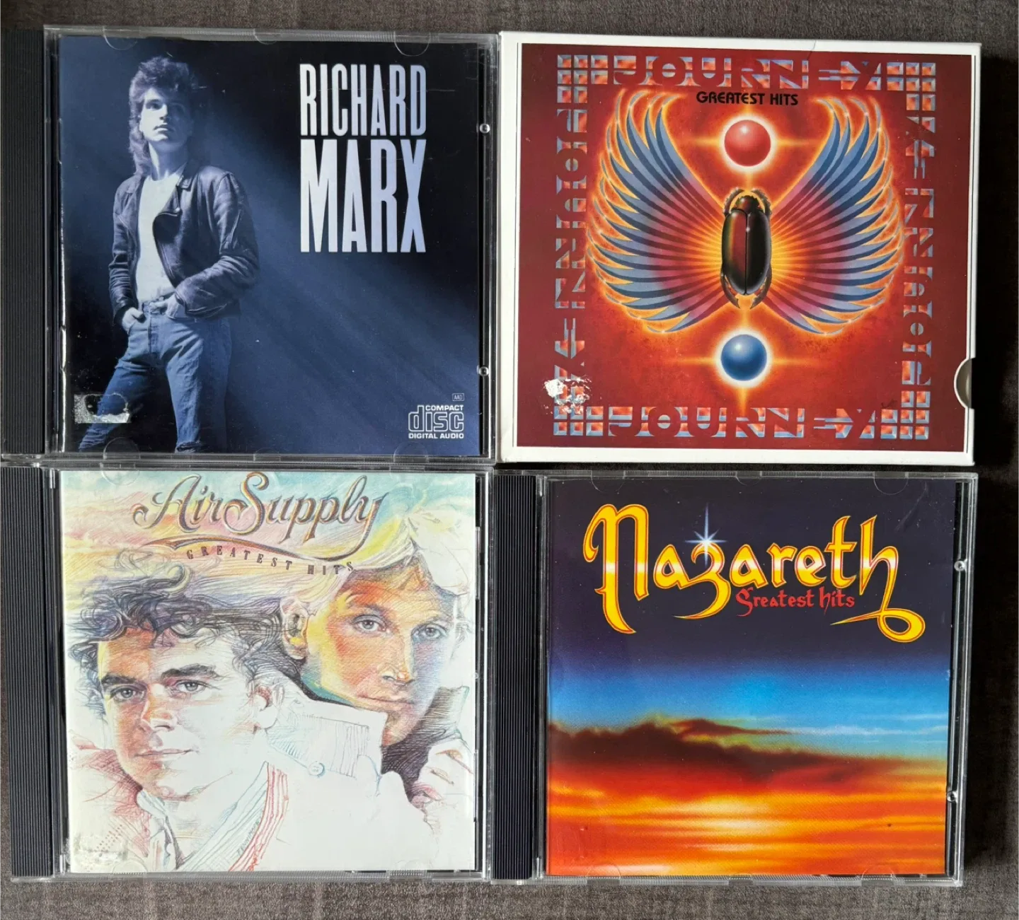 Mixed CDs - ABBA, Mark Wills, George Strait & More! image indicator(9)