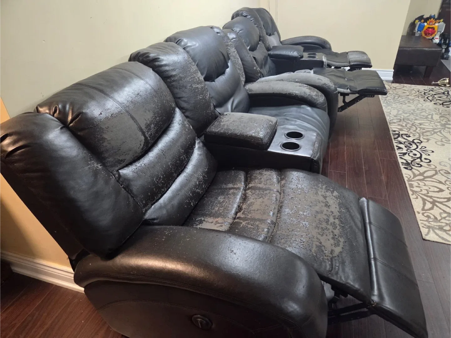 Free - Worn Black Leather Reclining Theatre Seating