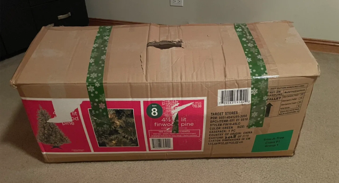 Target Brand 4 1/2 FT Pre-Lit Artificial Christmas Tree. image indicator(7)