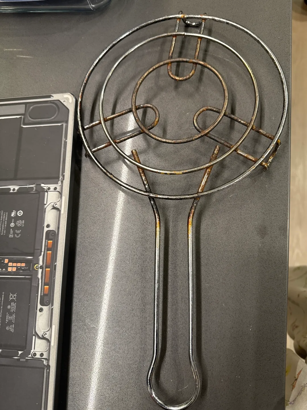 Used Metal Trivet with Handle thumbnail