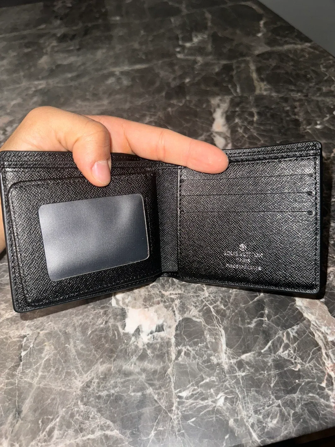 Louis Vuitton Black Leather Wallet image indicator(3)