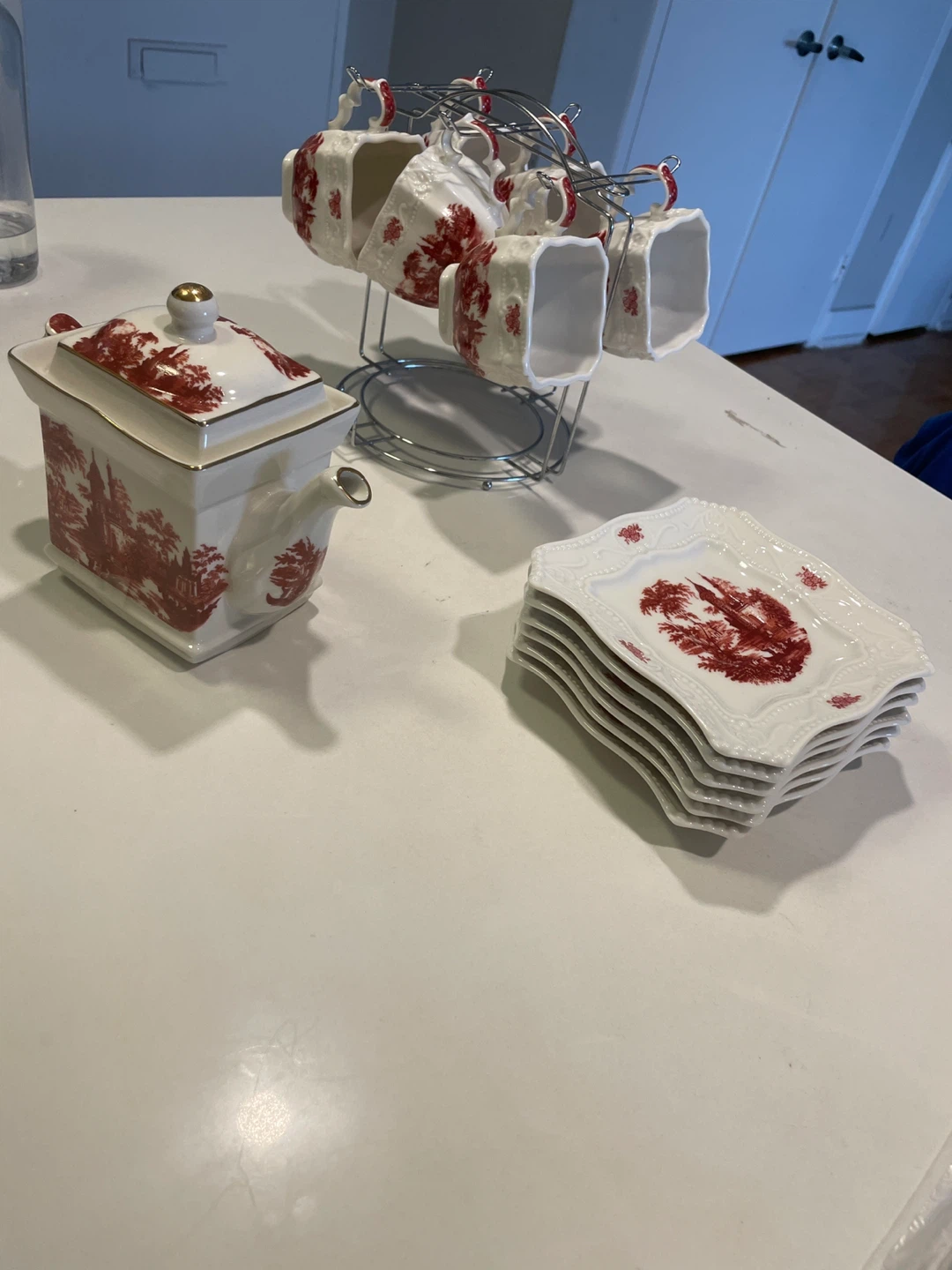 Vintage Tea Set with Teapot, Cups, and Plates