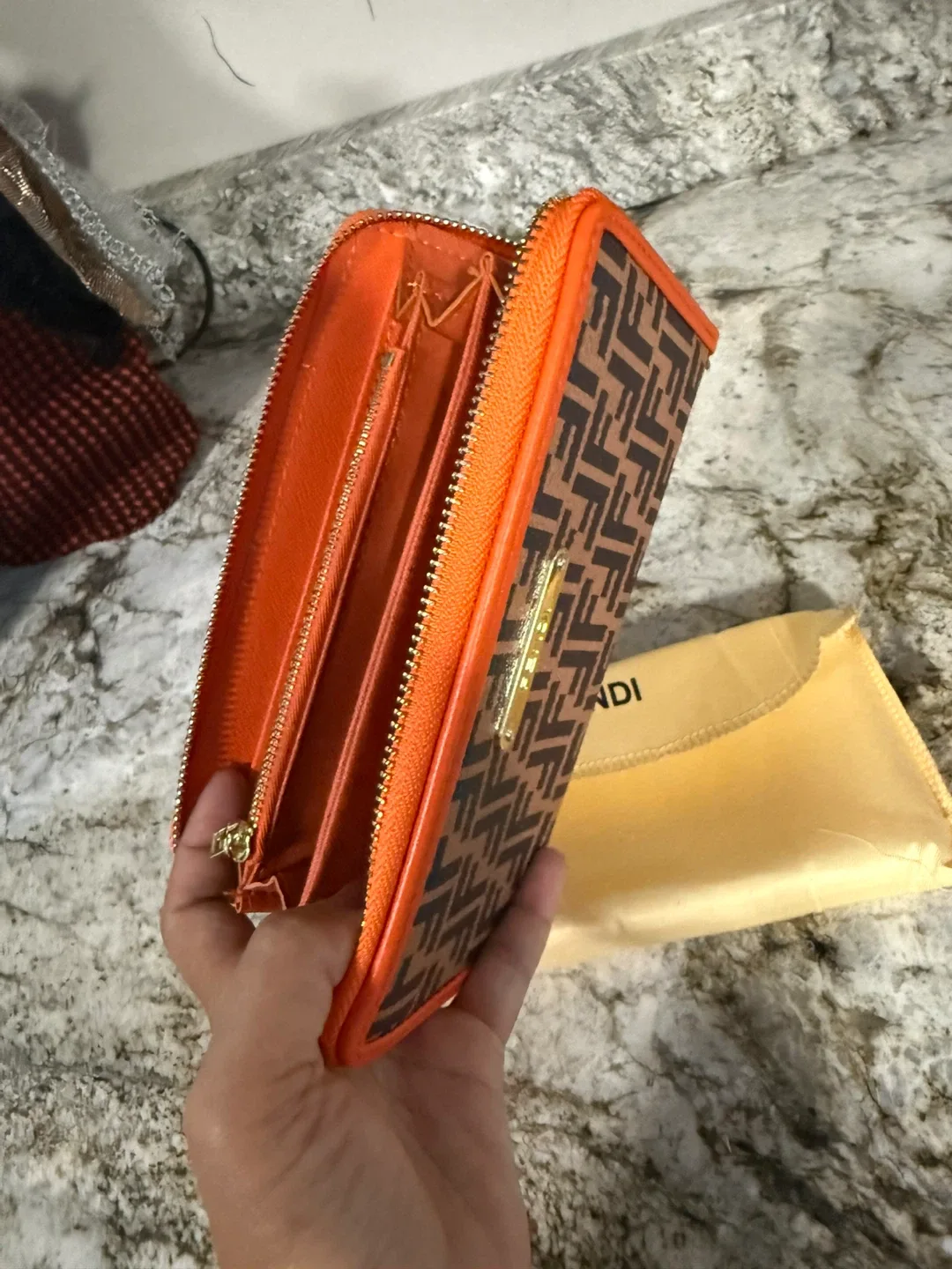 New Fendi Orange Wallet check more pictures image indicator(3)