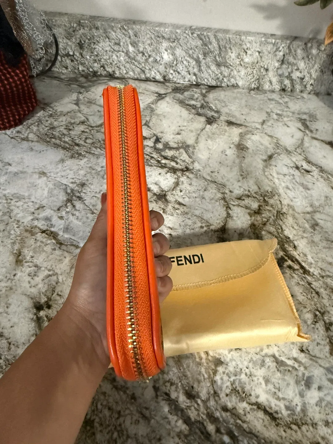 New Fendi Orange Wallet check more pictures image indicator(7)