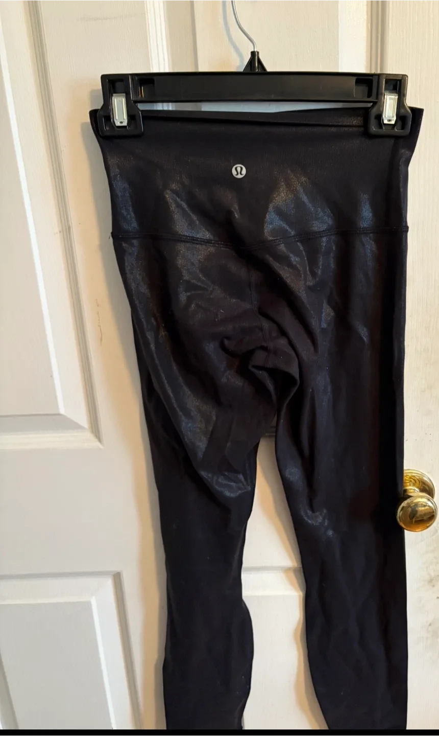Lululemon Black Leggings foil leggings size 4 tight 25 image indicator(2)