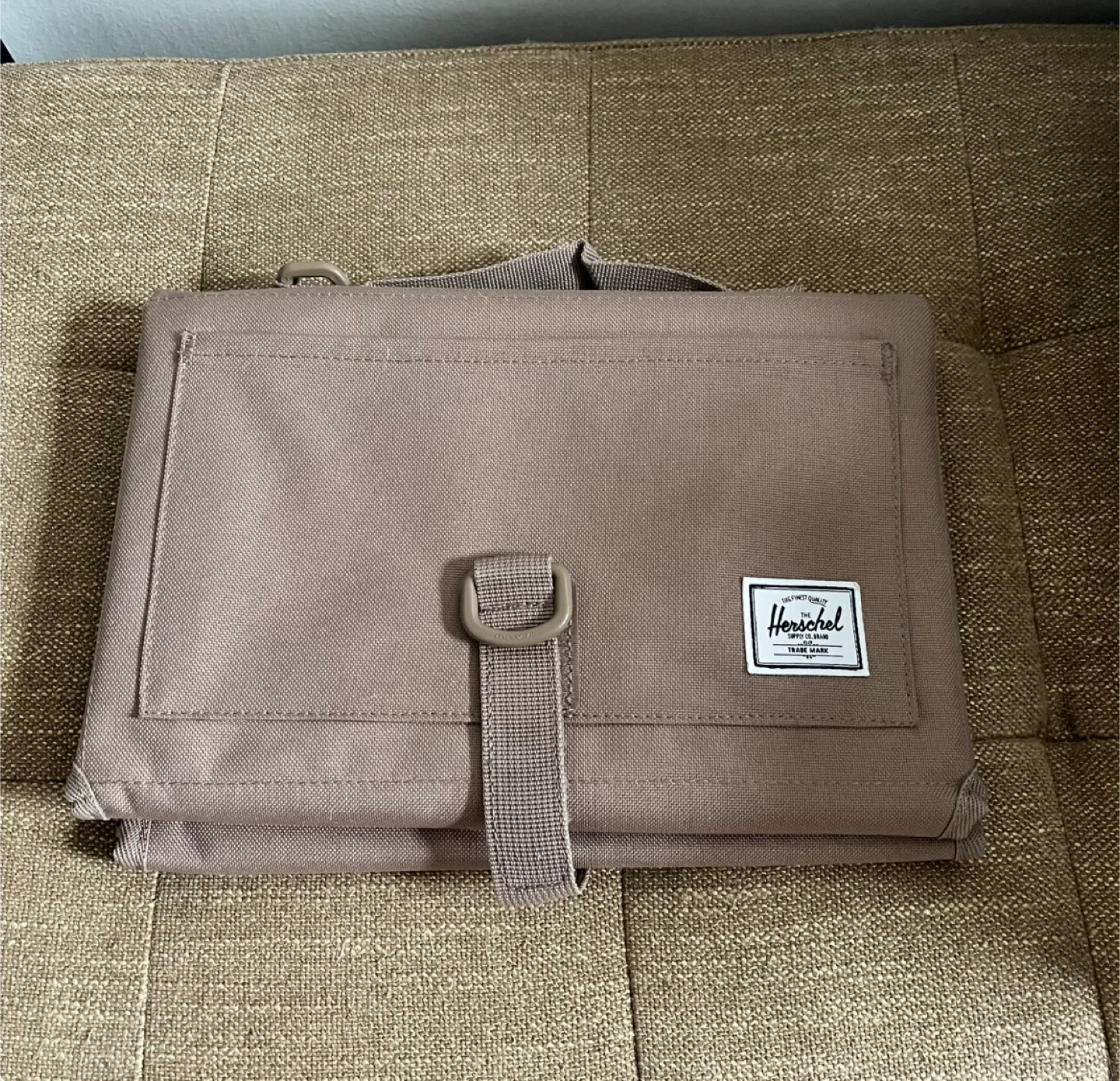 Used Herschel portable changing table