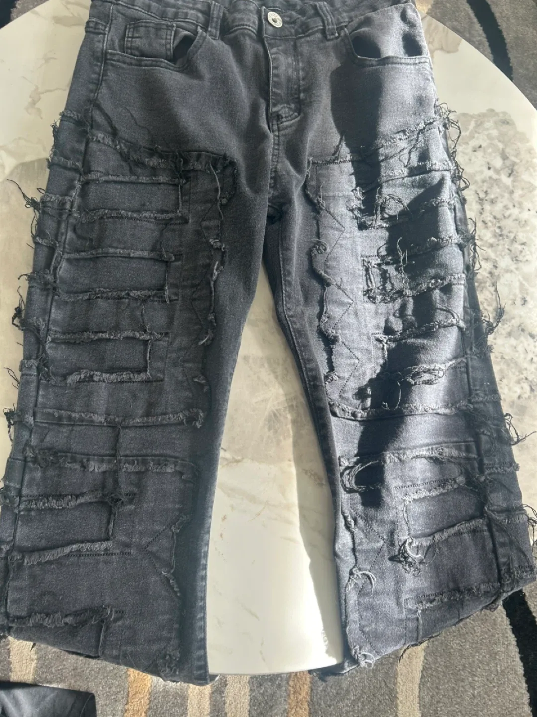 Distressed stacked Black Jeans image indicator(3)