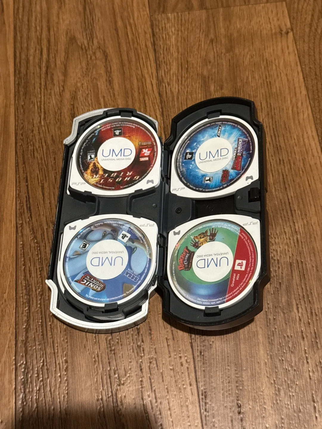 PSP UMD Game Lot with Case image indicator(2)