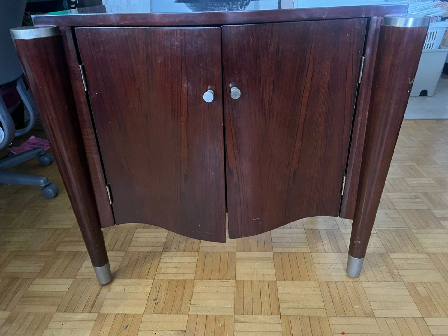 Dark Wood Cabinet with Silver Accents