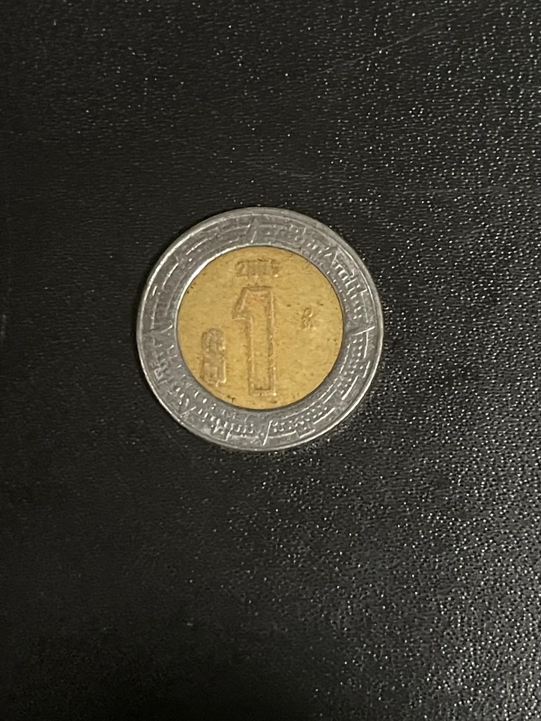 bimetallic Mexican one peso coin. thumbnail