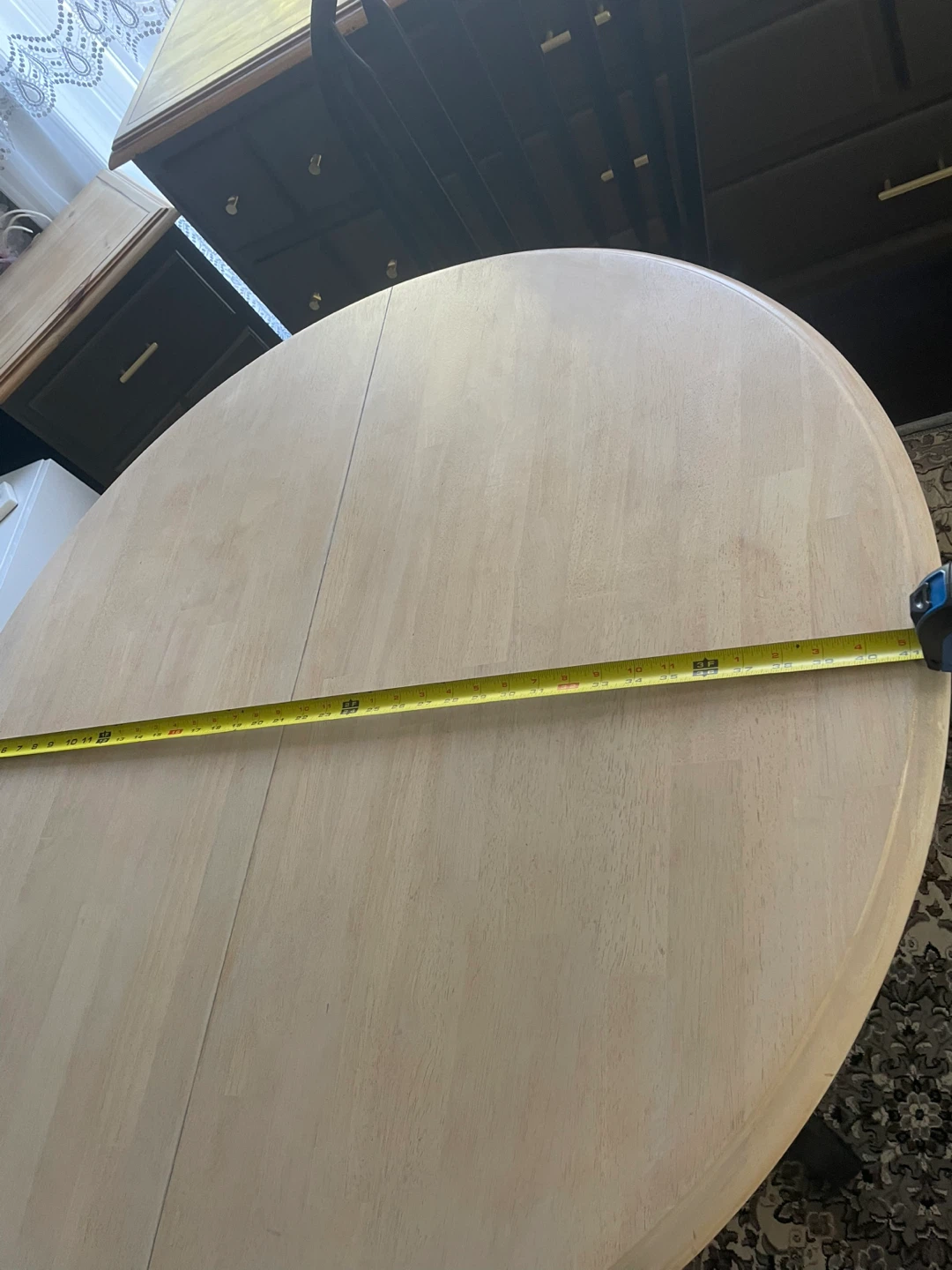 Round Wooden Extendable Dining Table