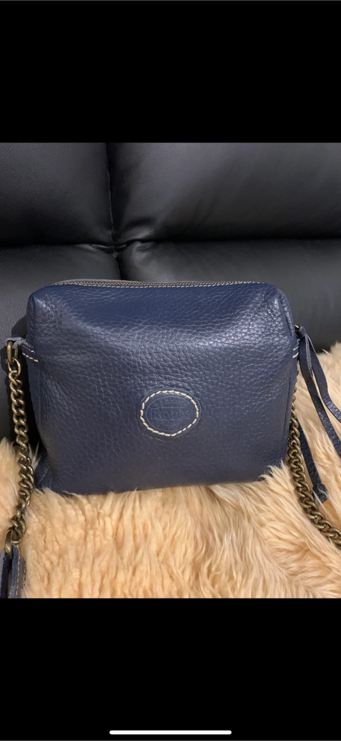 ROOTS Women's Messenger Bag .  $ 70
