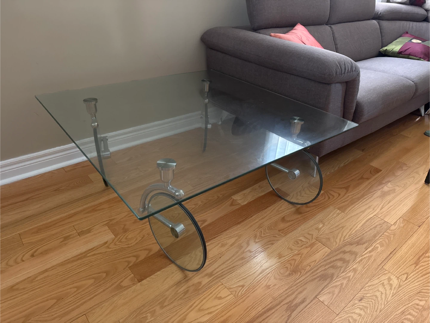 Glass Coffee Table with Wheel Design