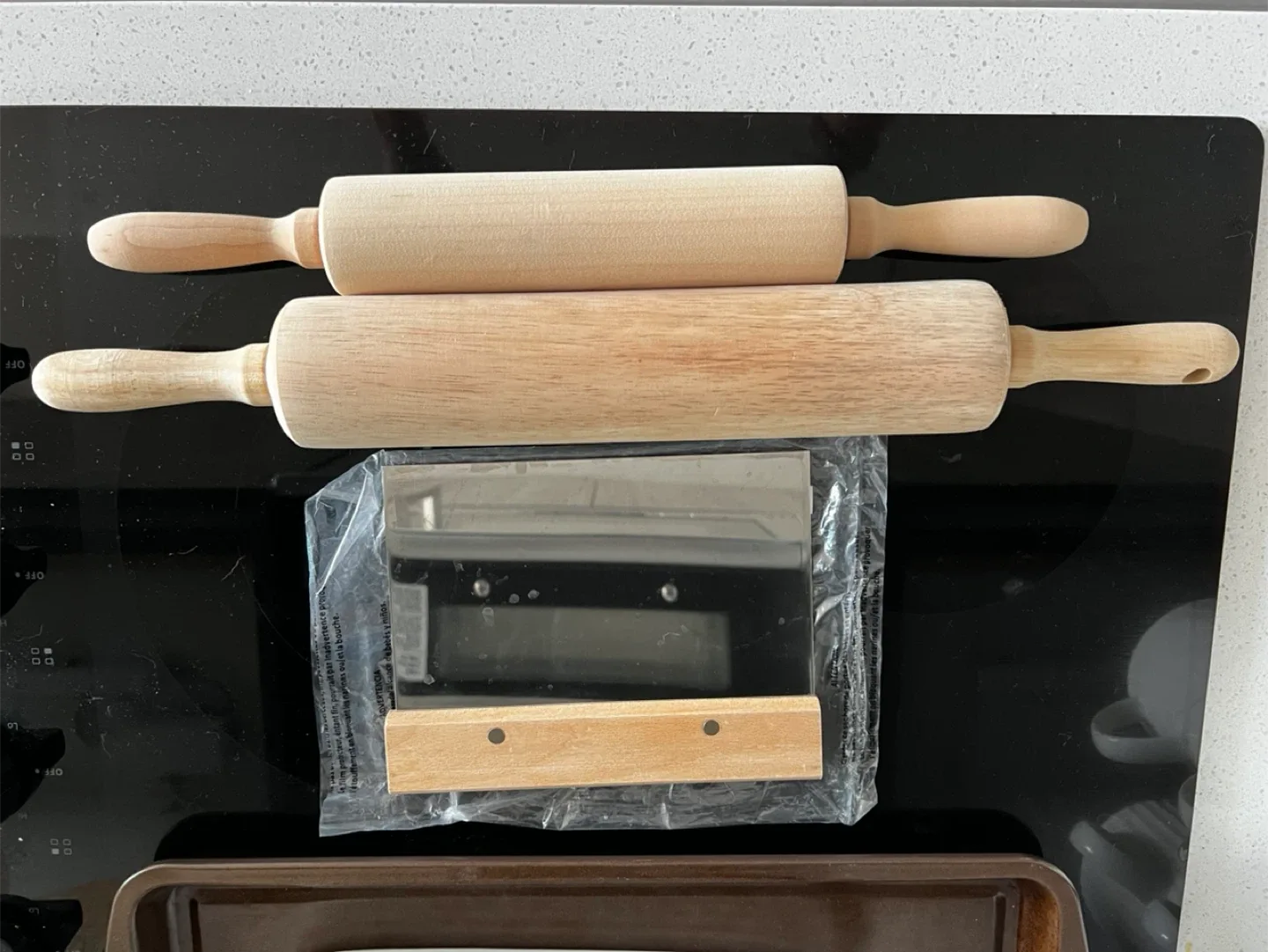 2 wooden rolling pins + dough cutter