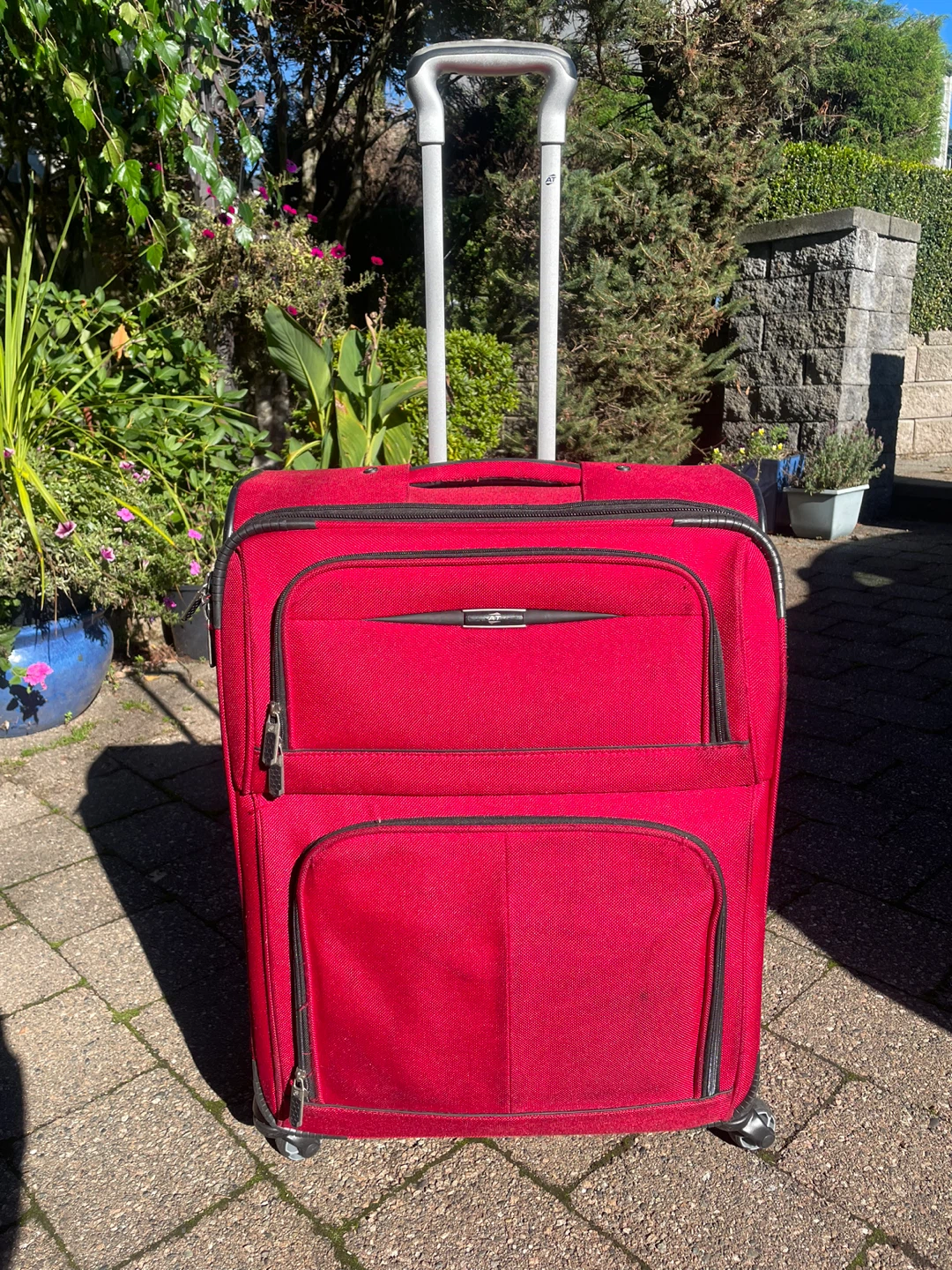Red Rolling Suitcase