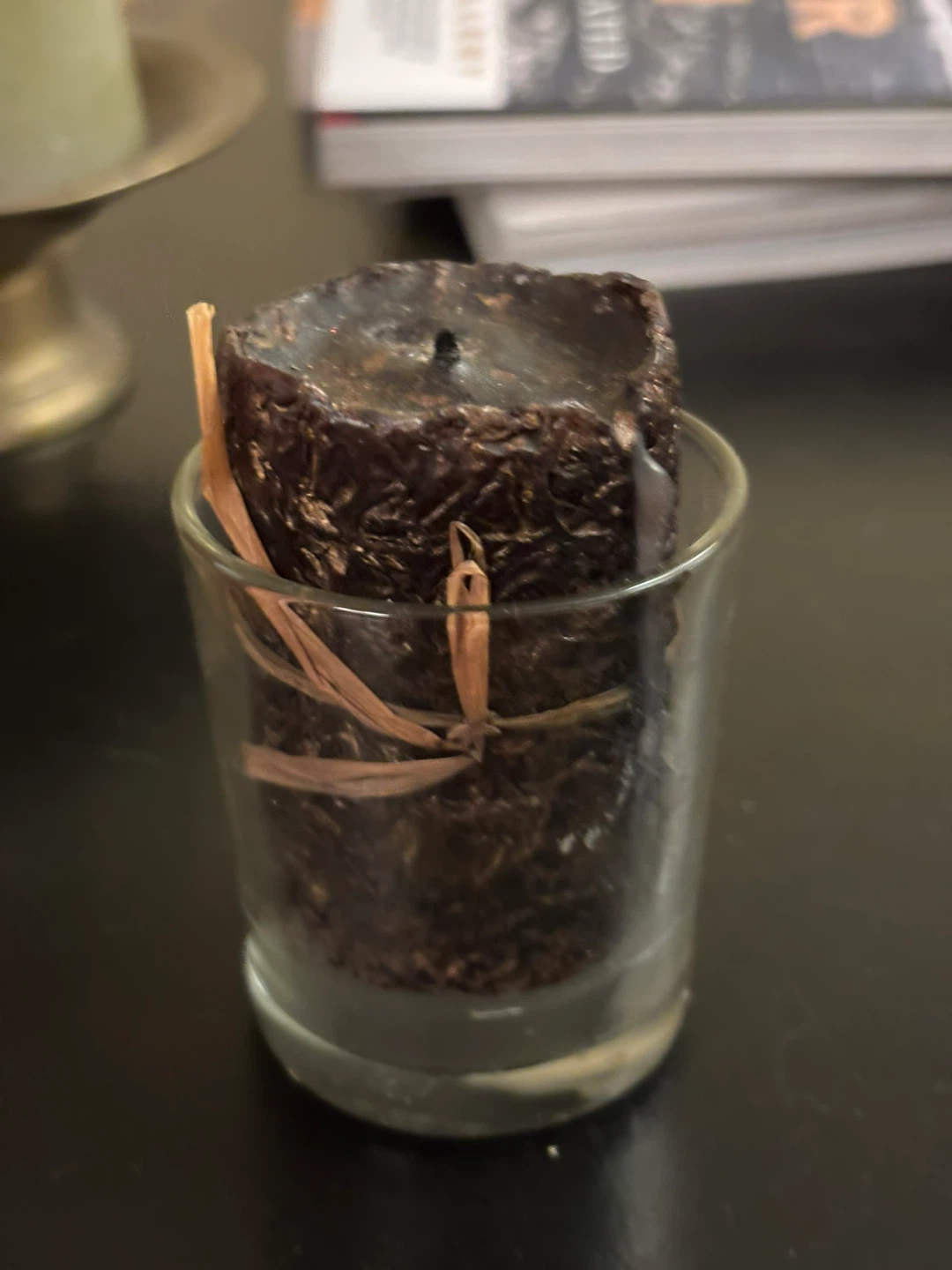Used Brown Candle in Glass Holder