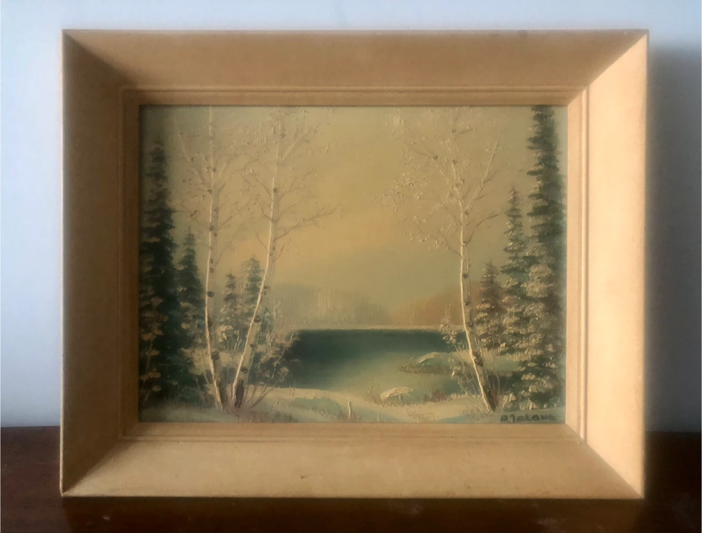 This is a vintage Canadian landscape painting.