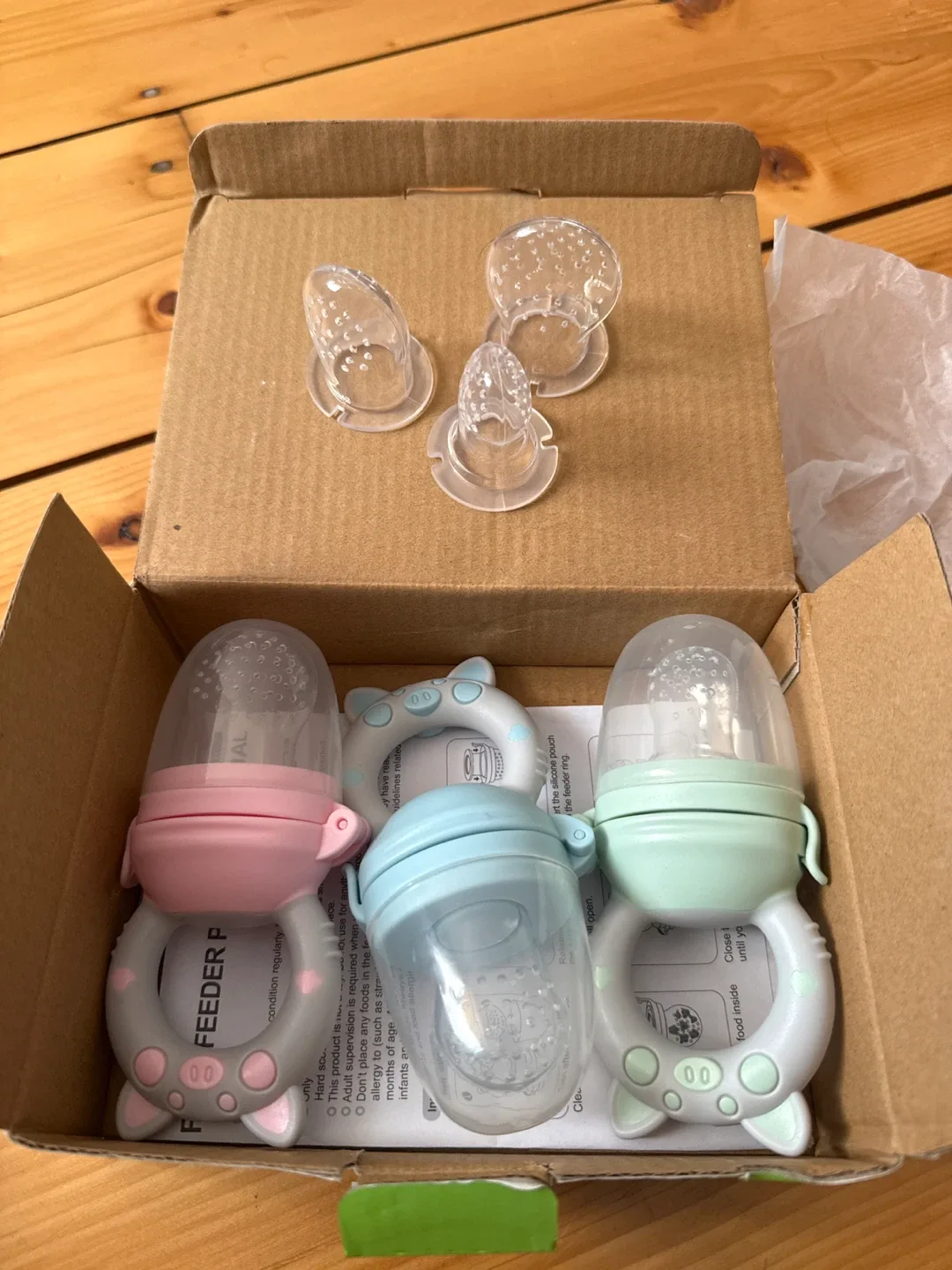 Eco Inspired Piggy Handle Fresh Food Feeder - New image indicator(2)