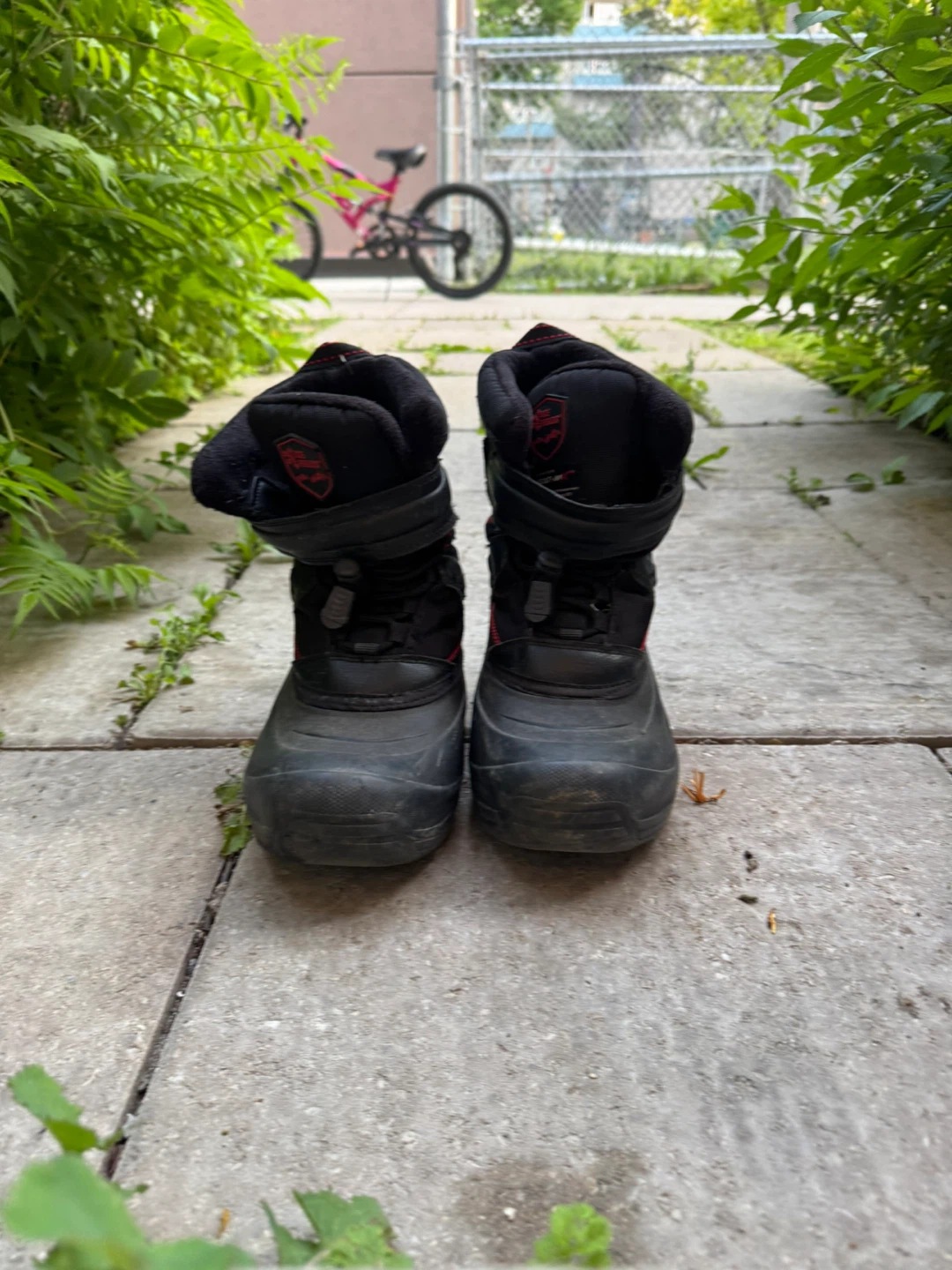 Black winter boots, size unknown