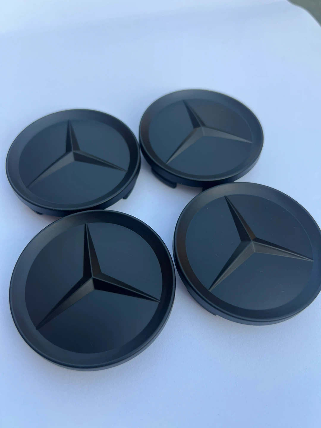 Mercedes-Benz 63mm Matte Black Wheel Center Caps - Set of 4