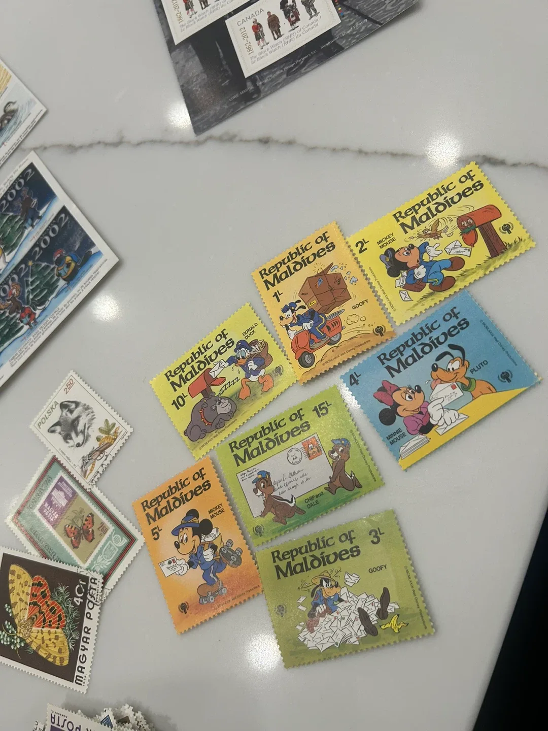 Vintage stamp collection from different years and countries image indicator(6)