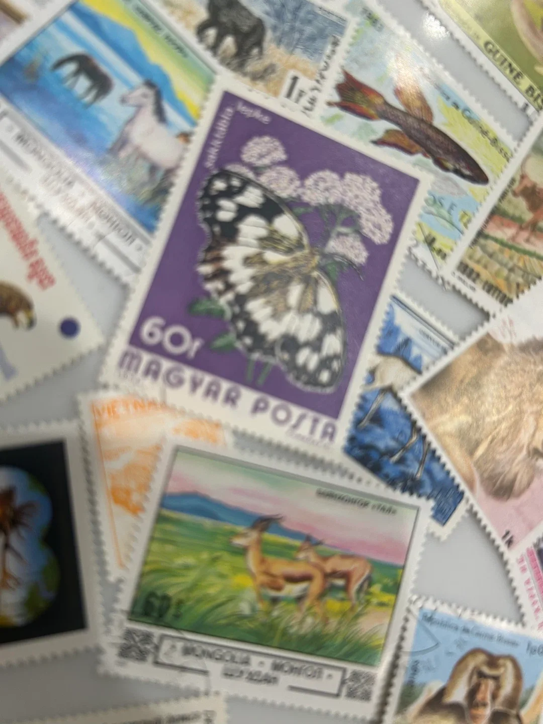 Vintage stamp collection from different years and countries image indicator(2)