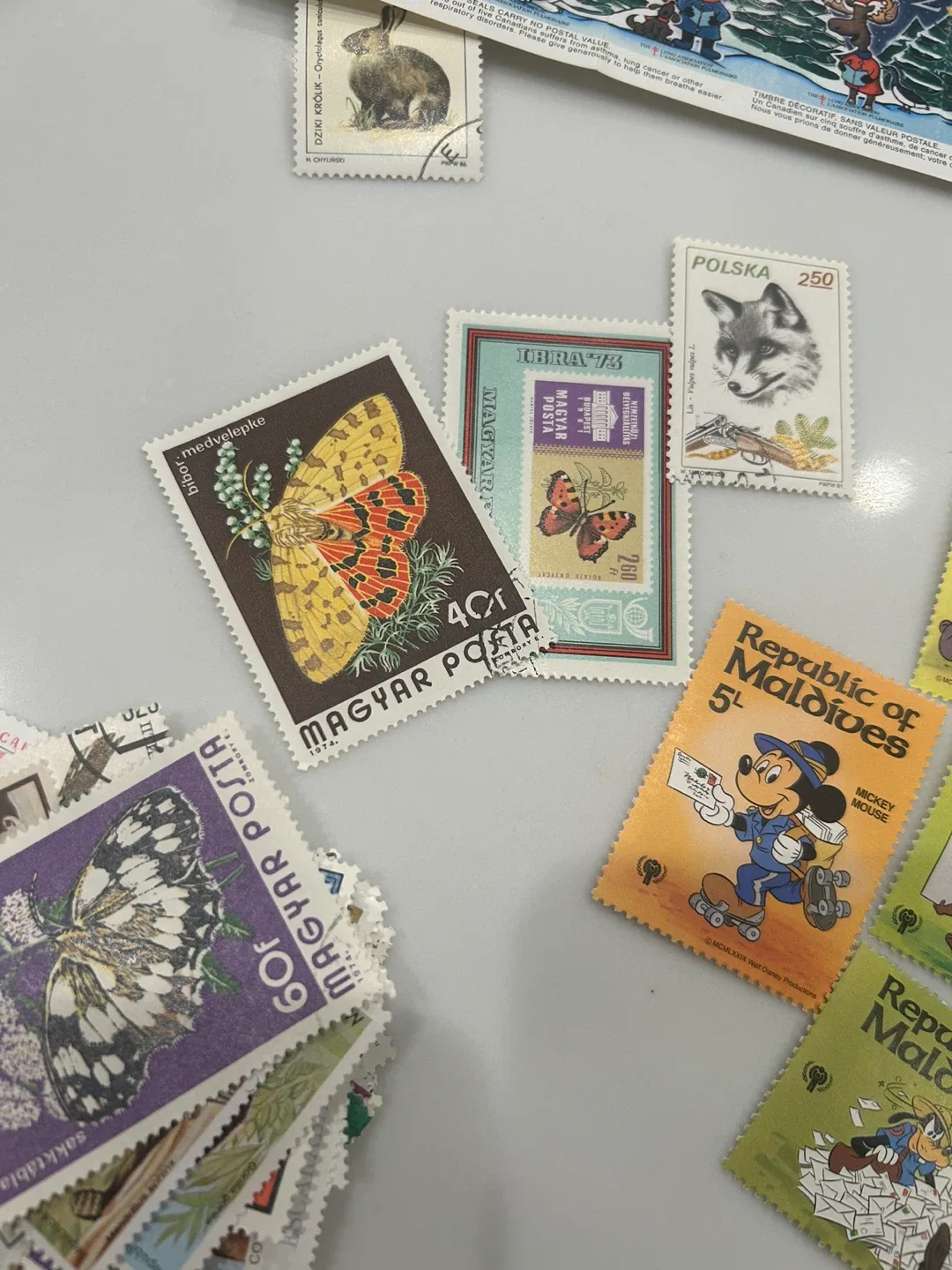 Vintage stamp collection from different years and countries image indicator(9)