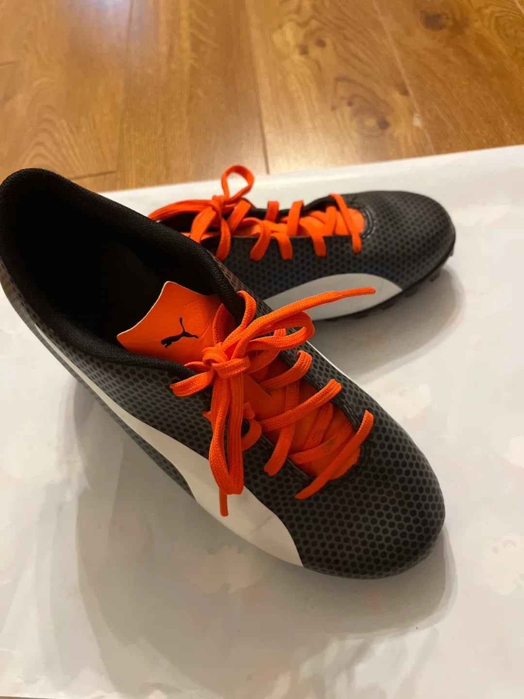 Puma Soccer Cleats, Grey & Orange with shin guards image indicator(2)