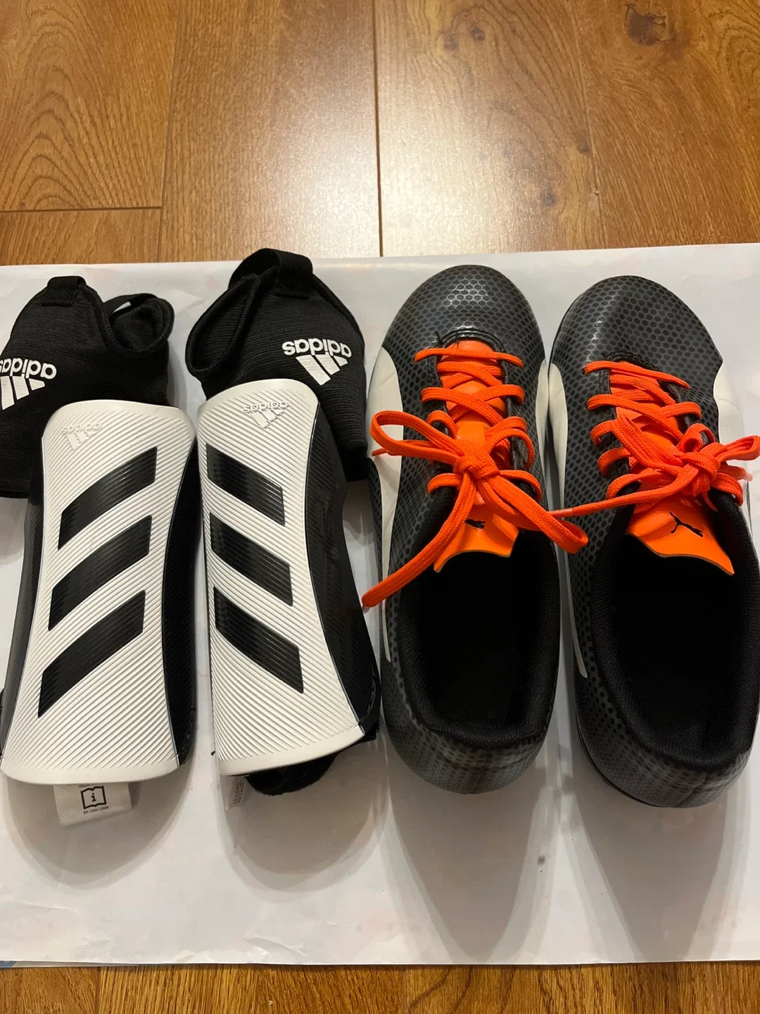 Puma Soccer Cleats, Grey & Orange with shin guards image indicator(4)