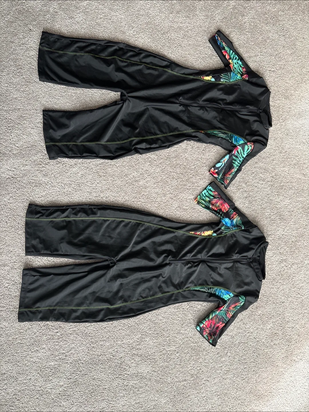 2 pieces of Black XS Swimsuit - Tropical Sleeve Accents
