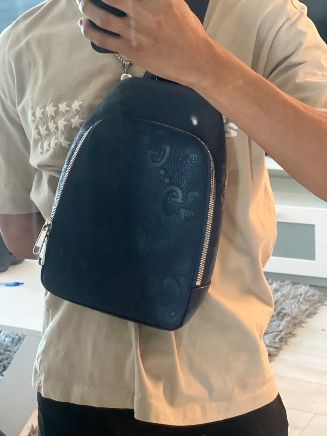 Gucci Embossed Leather Sling Backpack - photo 2