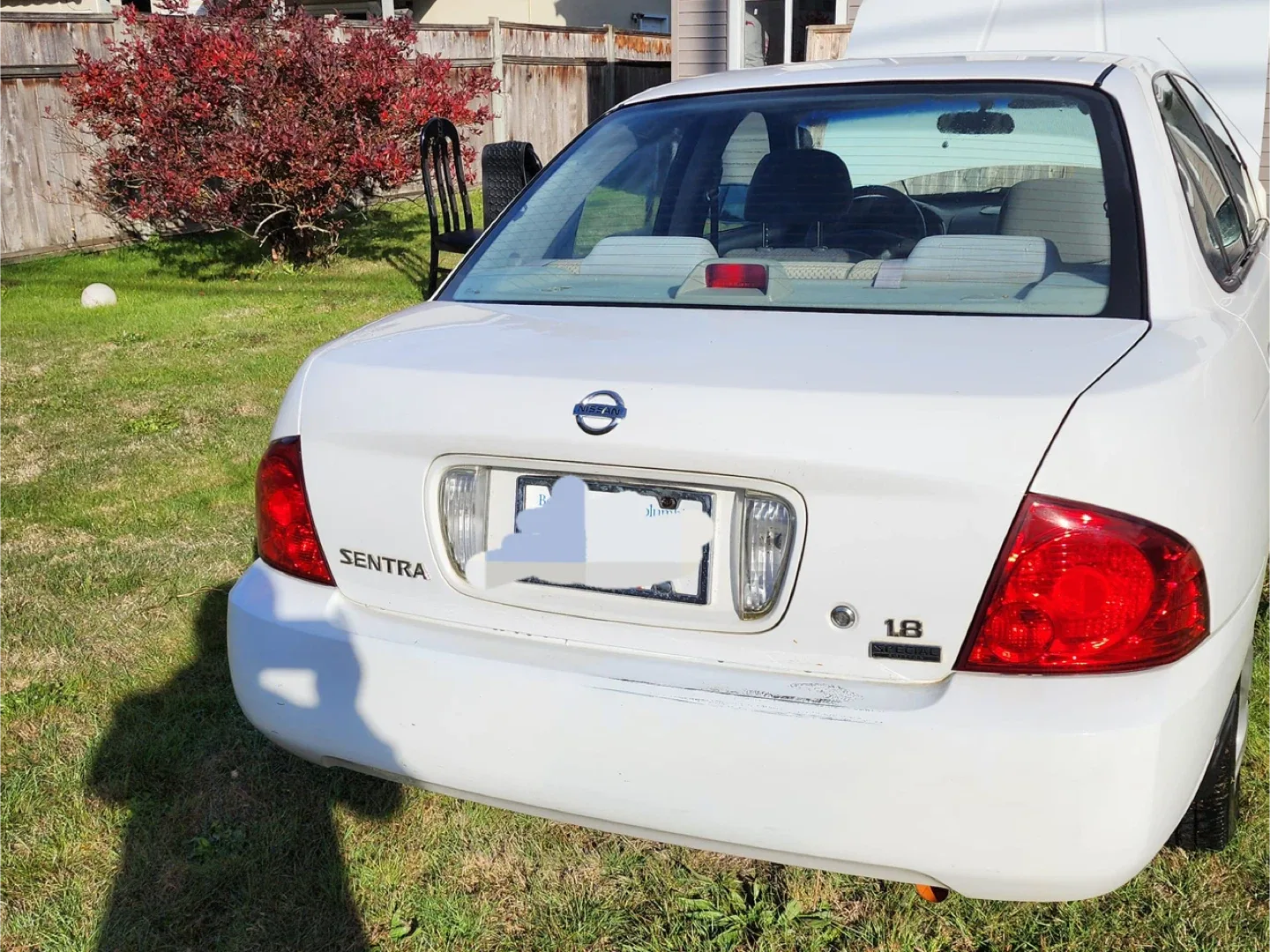 Nissan Sentra, White Sedan image indicator(10)