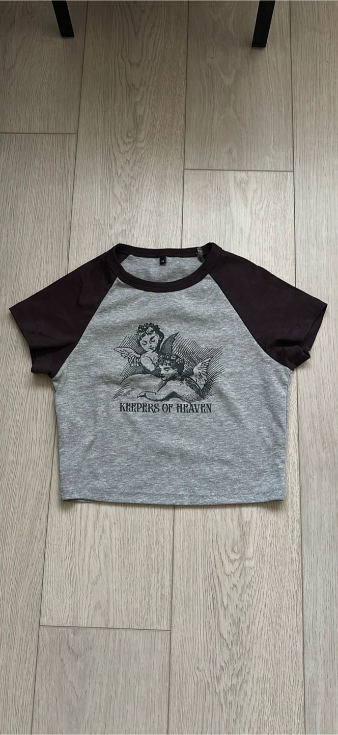 Y2K girl Keepers of Heaven Graphic Tee - XS