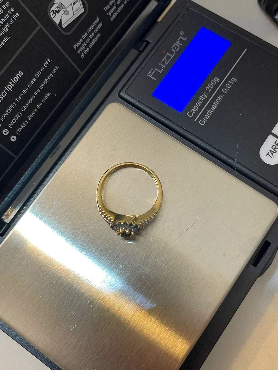 Gold sterling Ring with blue and white diamonds image indicator(3)