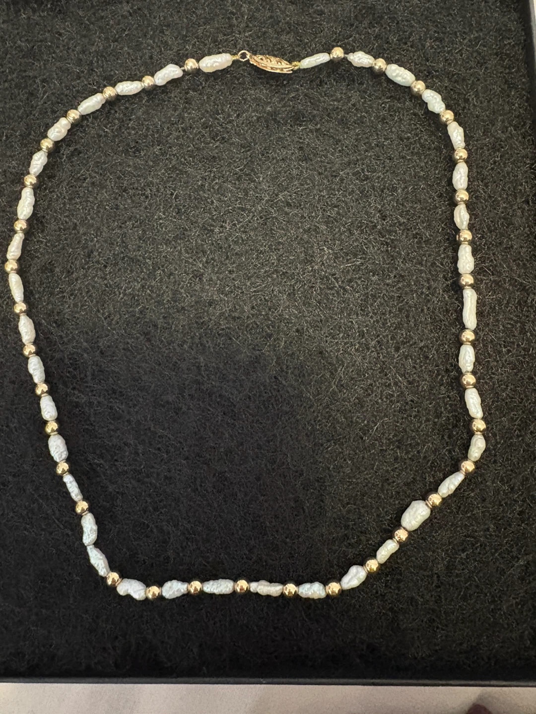 Genuine Rice Pearl and 14 karat Gold Bead Necklace