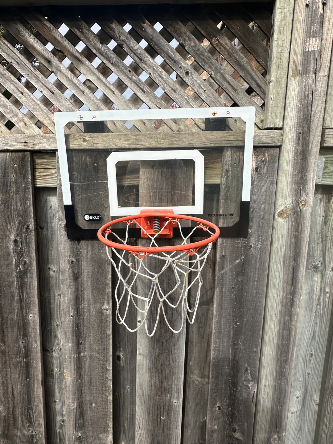 Portable basketball net