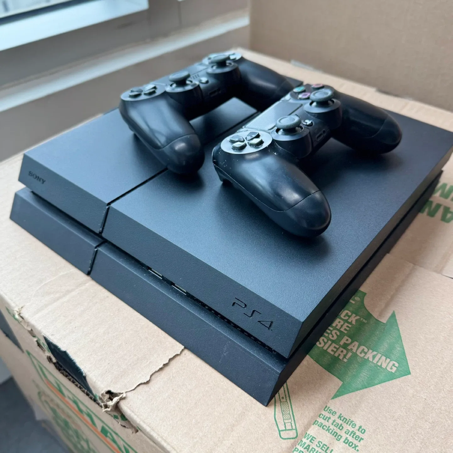 Sony PlayStation 4 (PS4) with 2 Controllers image indicator(2)