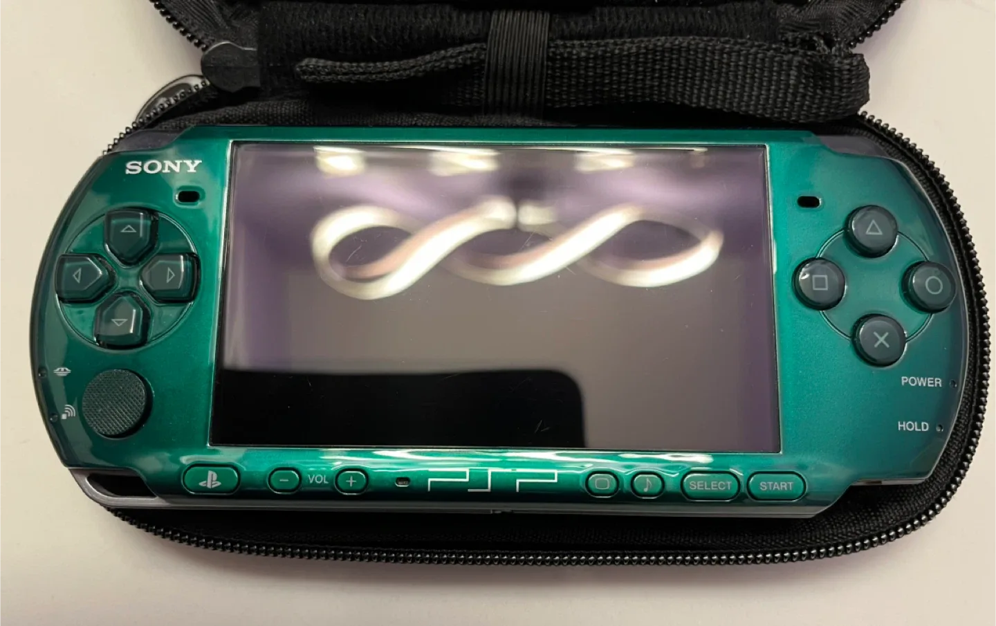 PSP 3001 Metal Gear solid Limited Edition + Games image indicator(4)