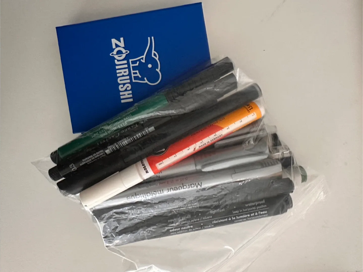 Sticky not pad, pens and markers thumbnail