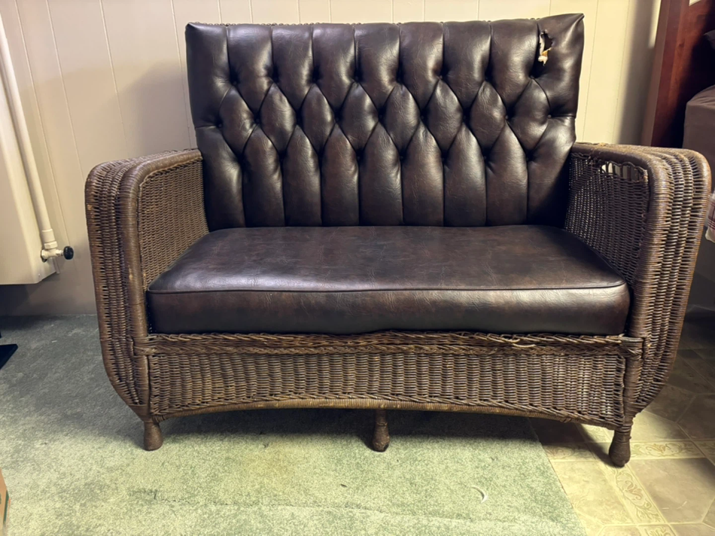 Wicker Loveseat with Brown Leather Cushion
