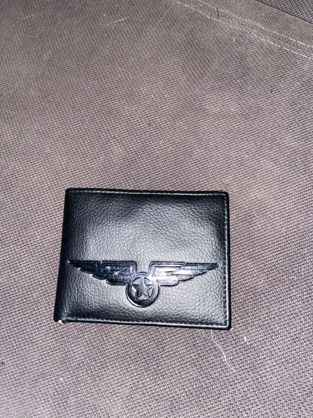 Black Leather Wallet with Winged Star Logo