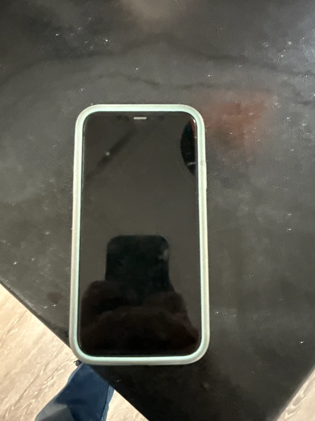 iPhone with light blue case